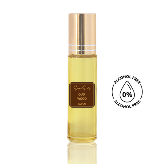 10ml roll-on bottle of Oud Wood inspired perfume oil – Luxe Perfume, alcohol-free attar with oud, spices, and vanilla notes